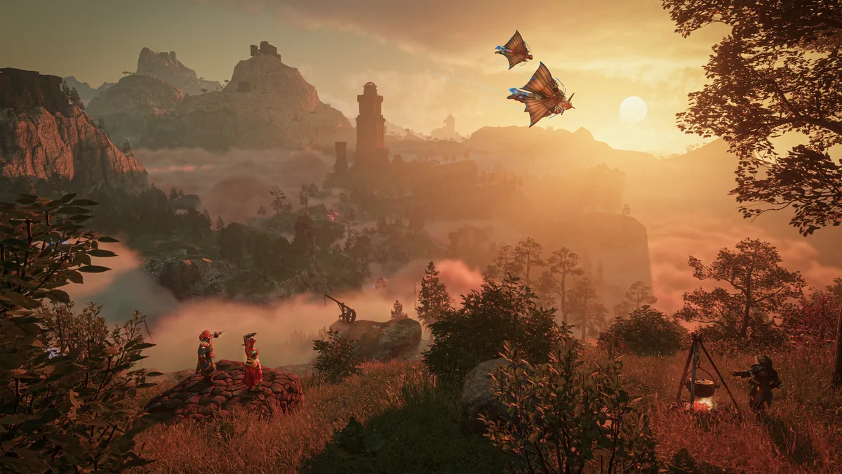 Sunset over Embervale in Enshrouded, with two players gliding across the valley